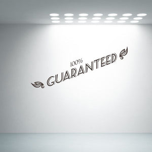 Vinyl wall decal: “100% GUARANTEED” with wing icons, dark lettering