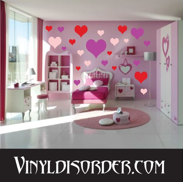 Heart vinyl wall decal set with assorted red, pink, and purple hearts