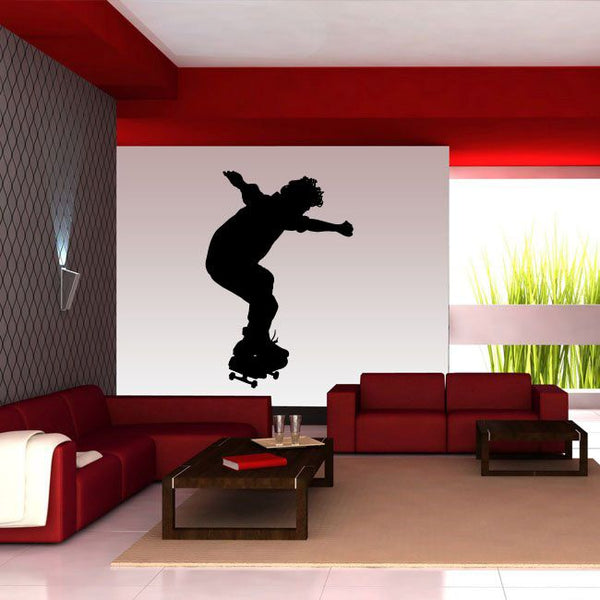 Black skateboarder silhouette wall decal with skateboard graphic