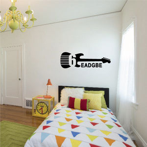 Black 6-string guitar scale wall decal with EADGBE note pattern