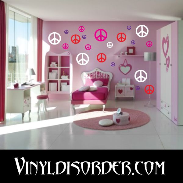 Vinyl peace sign wall decals with pink and purple peace symbols, multiple sizes