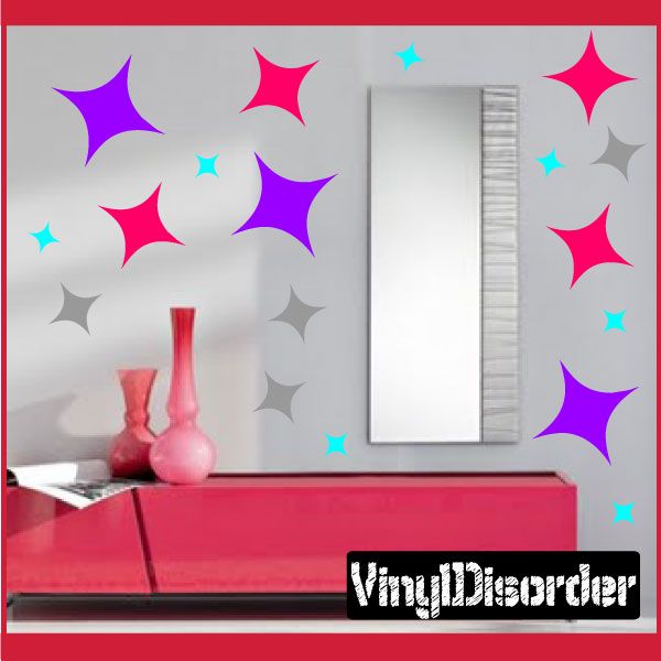 Starburst wall decal kit with purple, pink, gray, and light blue star shapes