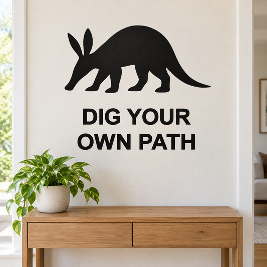 Aardvark wall quote decal with black animal silhouette and text 'DIG YOUR OWN PATH'