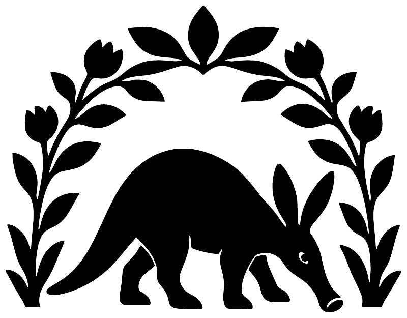Black aardvark silhouette vinyl decal under botanical arch, close-up