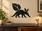 Black aardvark vinyl wall decal with two leaf accents