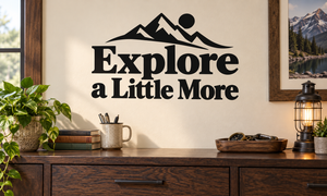 Vinyl wall decal: mountain icon and “Explore a Little More” text.