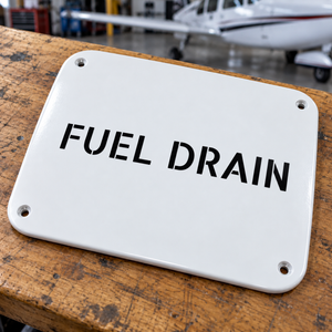 Fuel drain aircraft label with black FUEL DRAIN text and four corner screw holes