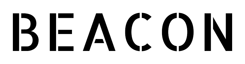 Close-up of BEACON lettering on a black label plate