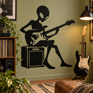 Alien guitarist vinyl decal: black alien silhouette playing electric guitar with amp