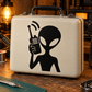 Alien vinyl decal with radio-contact silhouette on light suitcase