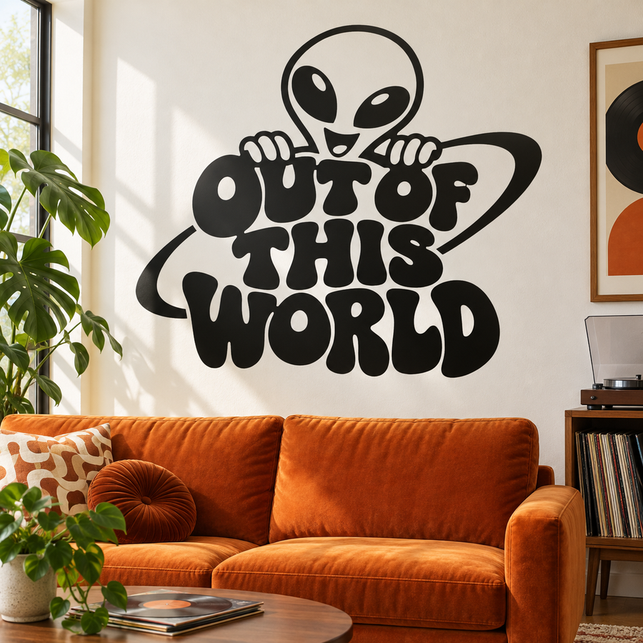 Alien vinyl decal with big-eyed alien and dripping OUT OF THIS WORLD lettering