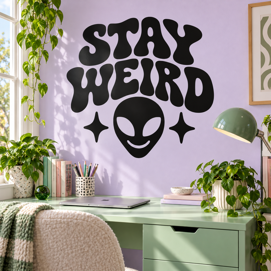 Black alien vinyl decal with dripping 'Stay Weird' text