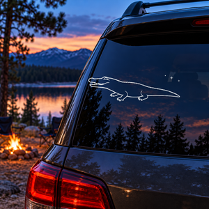 Alligator window decal with open jaw, ridged back outline, and small constellation spark cluster