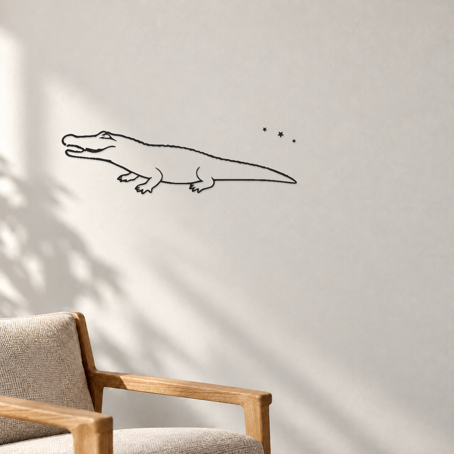 Black vinyl alligator decal with three-star trail, side profile