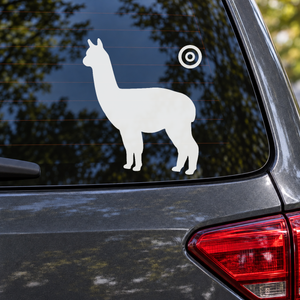 Standing white alpaca decal with upright ears and circular orbit halo on car window