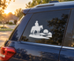 Vinyl decal with white cowboy on horse and circular sunset