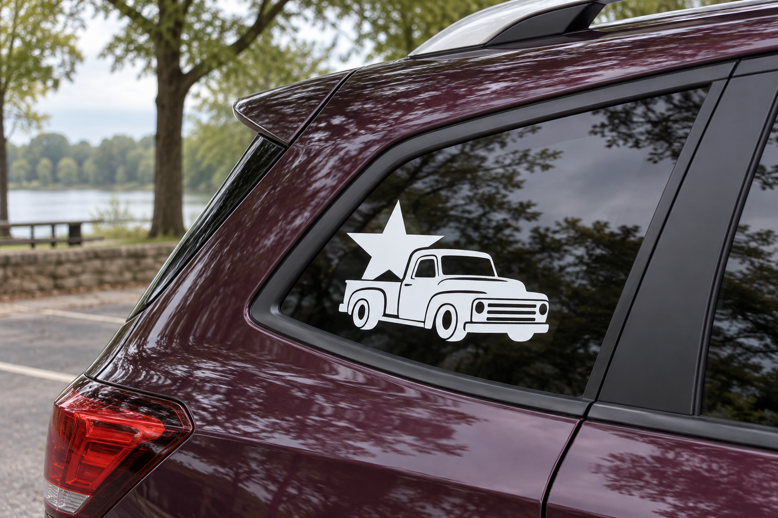 White star and pickup truck vinyl decal on car rear window