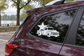 White star and pickup truck vinyl decal on car rear window