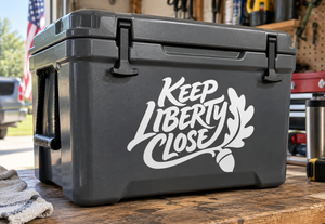 Vinyl decal with white “Keep Liberty Close” lettering on a dark surface
