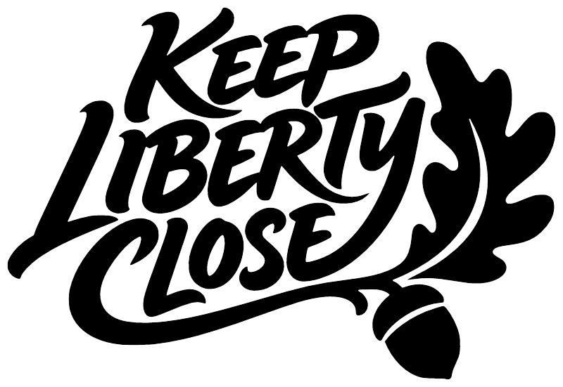 Vinyl decal with black “Keep Liberty Close” script and paw prints