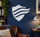 Shield vinyl decal with abstract flag stripes in white and dark blue