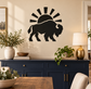 Black bison vinyl decal with white rising sun above, wall-ready sticker design