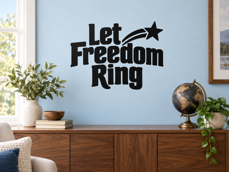 Vinyl decal reading "Let Freedom Ring" in bold black lettering with arrow and star