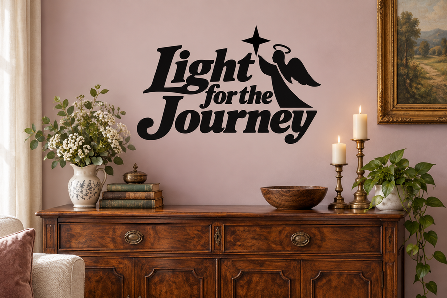 Angel-themed vinyl decal with star and “Light for the Journey” script