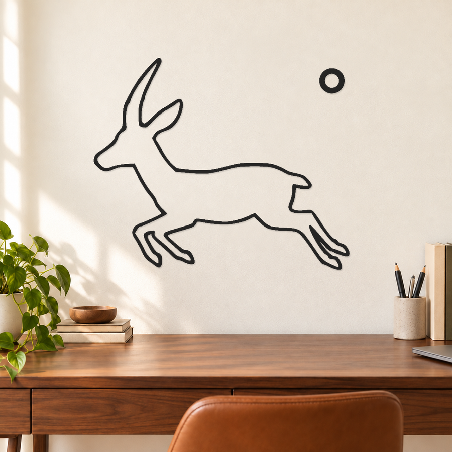 Black leaping antelope vinyl wall decal with small rising sun ring circle detail