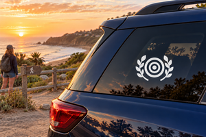 Archery laurel target vinyl decal on a vehicle rear window, white emblem on dark glass