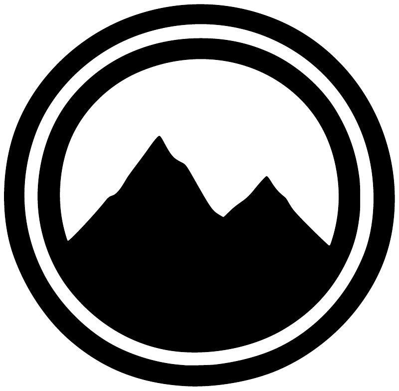 Mountain landscape vinyl decal: black peaks inside a white circular border with rings
