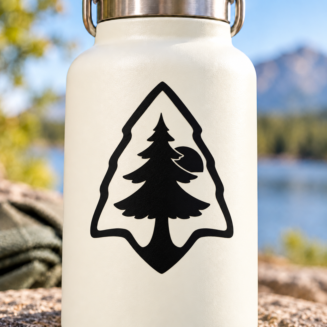 Black vinyl pine tree decal with shield/arrow outline