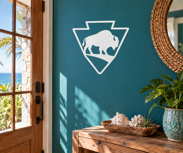 White arrowhead vinyl decal with black-outlined bison silhouette