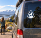 White mountain goat vinyl decal on car window, triangular outline