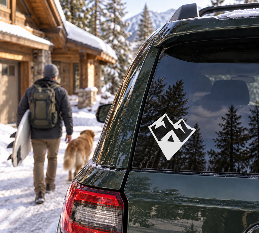 Mountain arrowhead vinyl decal on dark car rear window