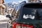 Alpine twin peaks horizon vinyl decal with pine trees and mountain reflection on car window