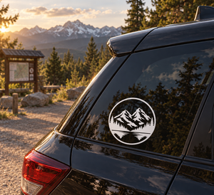 Circular alpine mountain vinyl decal on car rear window