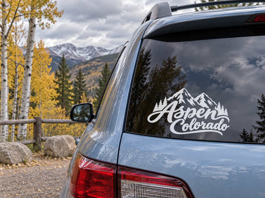 Vinyl decal wordmark with twin mountain peaks on a car rear window