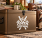 White vinyl decal on a metal suitcase front with Aspen Colorado After Hours logo