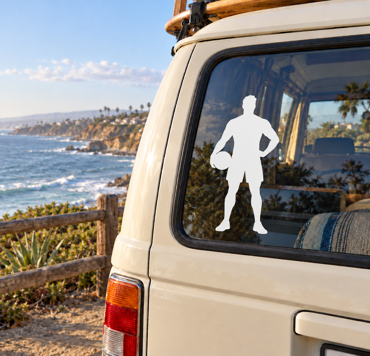Vinyl decal of athlete silhouette holding discus on vehicle window, white and black