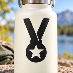 Medal vinyl decal: black medal icon with star on light backing