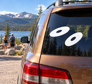 Car vinyl decal pair: two black discus-style ovals with white center highlights
