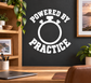 Vinyl wall decal with stopwatch icon and text 'Powered by Practice' in white.