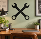 Black crossed wrenches wall decal with bold wrench silhouette