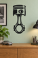Black piston engine wall decal with circular head and connecting-rod shape
