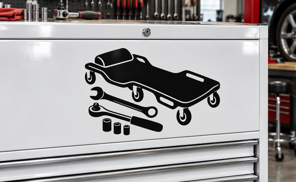 Silver metal tool chest with black mechanic tool graphic decal