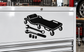Silver metal tool chest with black mechanic tool graphic decal