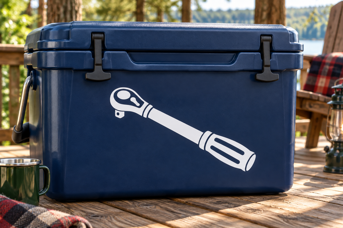 Blue hard cooler box with top handle and latch closures, wrench graphic on front