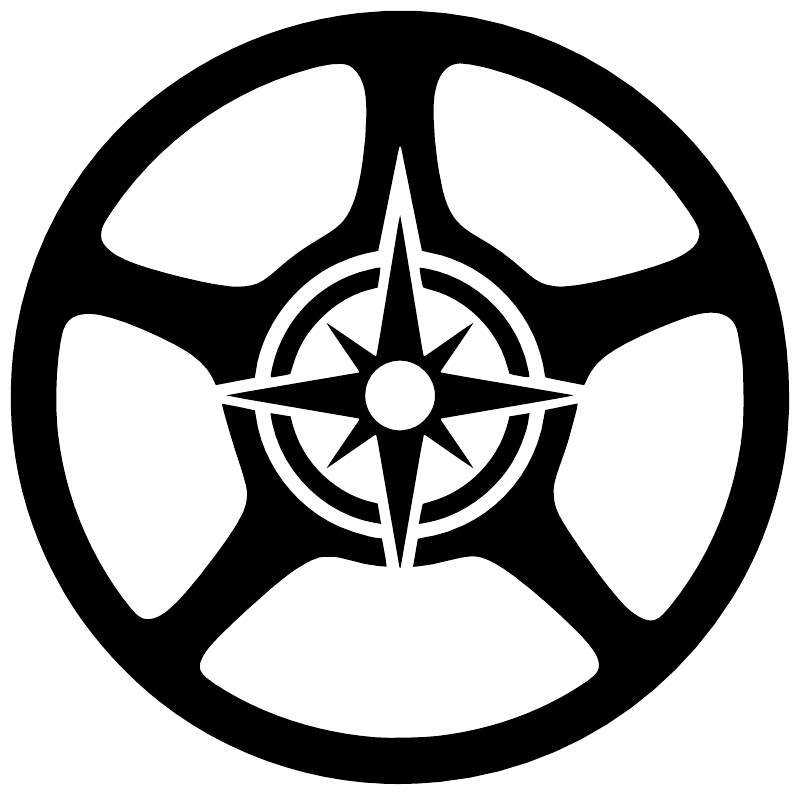 Circular steering wheel emblem decal close-up, black border with central star icon