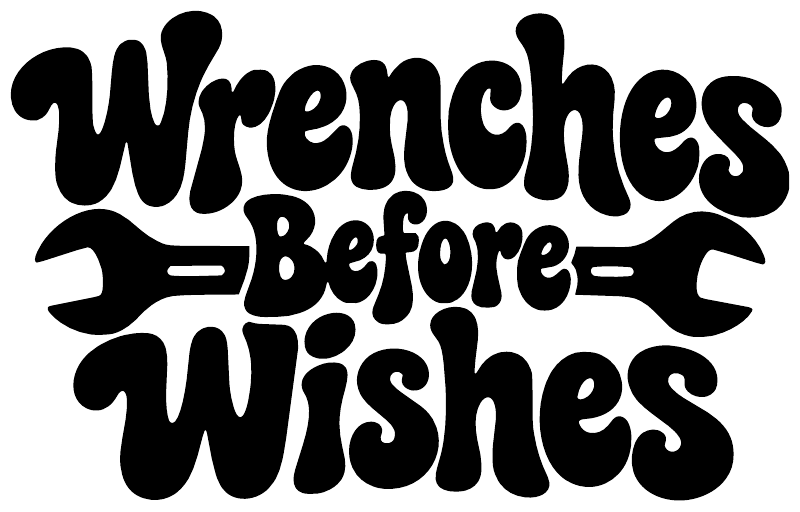 Black “Wrenches Before Wishes” wall decal text with wrench icons